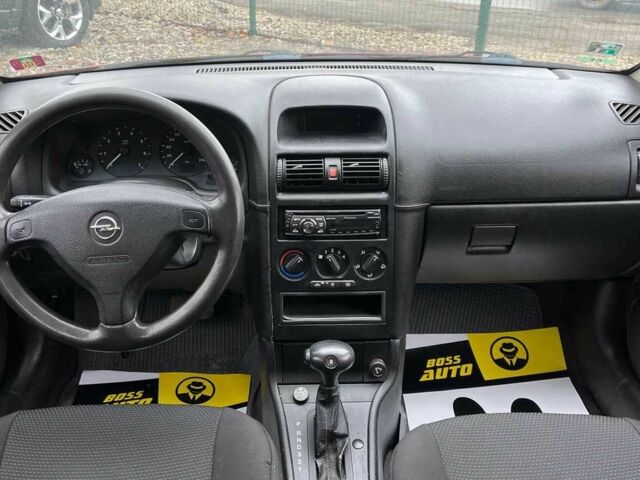 Червоний Опель Астра, об'ємом двигуна 1.6 л та пробігом 294 тис. км за 3699 $, фото 9 на Automoto.ua