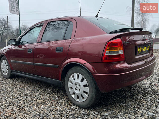 Красный Опель Астра, объемом двигателя 1.6 л и пробегом 294 тыс. км за 3699 $, фото 4 на Automoto.ua