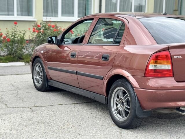 Червоний Опель Астра, об'ємом двигуна 1.4 л та пробігом 340 тис. км за 3000 $, фото 9 на Automoto.ua