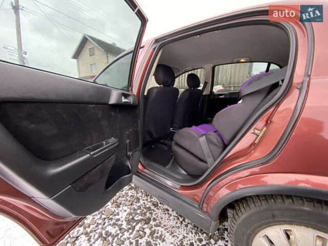 Красный Опель Астра, объемом двигателя 1.2 л и пробегом 327 тыс. км за 3200 $, фото 9 на Automoto.ua