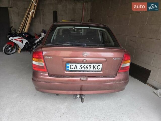 Красный Опель Астра, объемом двигателя 1.4 л и пробегом 114 тыс. км за 4100 $, фото 2 на Automoto.ua
