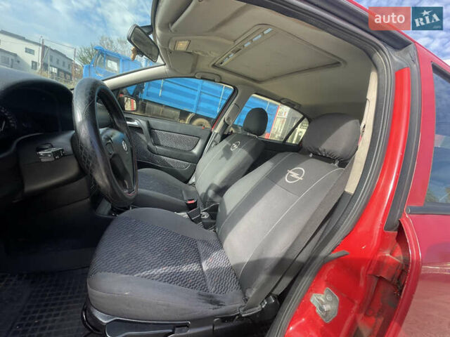 Червоний Опель Астра, об'ємом двигуна 1.8 л та пробігом 300 тис. км за 2200 $, фото 12 на Automoto.ua