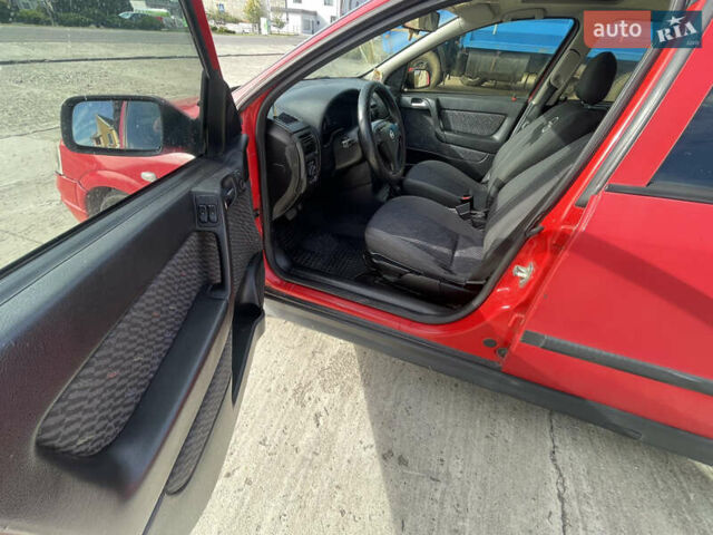 Червоний Опель Астра, об'ємом двигуна 1.8 л та пробігом 300 тис. км за 2200 $, фото 11 на Automoto.ua