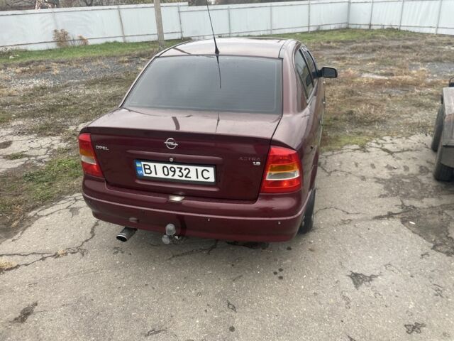 Красный Опель Астра, объемом двигателя 1.6 л и пробегом 270 тыс. км за 4000 $, фото 5 на Automoto.ua