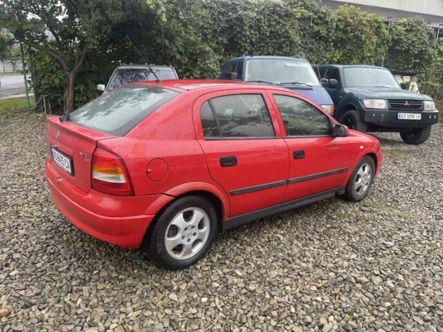 Красный Опель Астра, объемом двигателя 1.8 л и пробегом 300 тыс. км за 2200 $, фото 1 на Automoto.ua