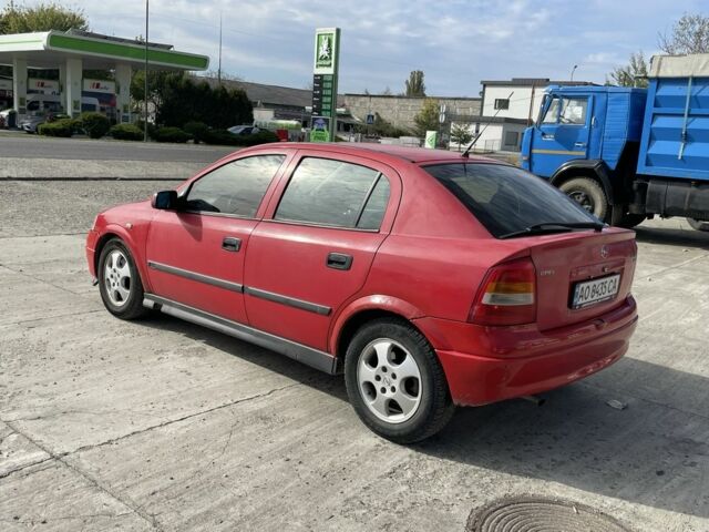 Красный Опель Астра, объемом двигателя 1.8 л и пробегом 300 тыс. км за 2200 $, фото 7 на Automoto.ua