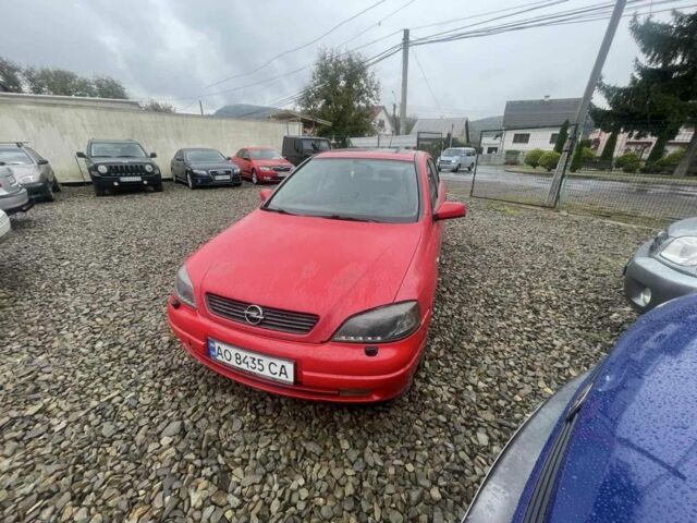 Красный Опель Астра, объемом двигателя 1.8 л и пробегом 300 тыс. км за 2200 $, фото 2 на Automoto.ua