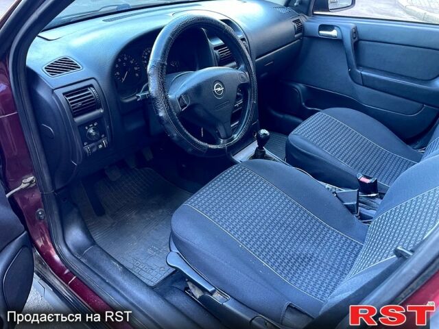 Красный Опель Астра, объемом двигателя 1.6 л и пробегом 250 тыс. км за 3300 $, фото 6 на Automoto.ua
