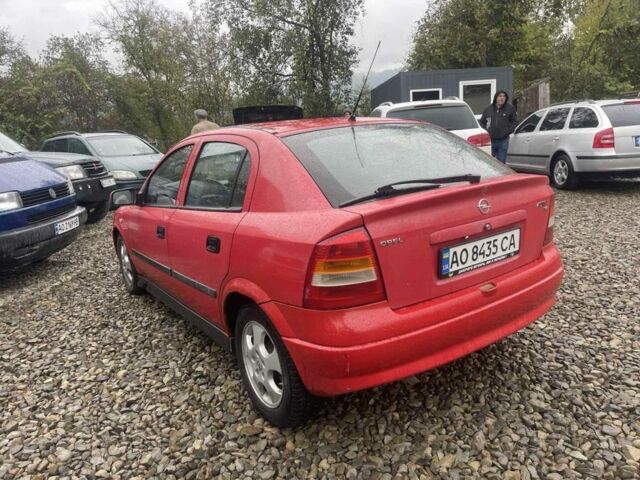 Красный Опель Астра, объемом двигателя 1.8 л и пробегом 300 тыс. км за 2200 $, фото 3 на Automoto.ua