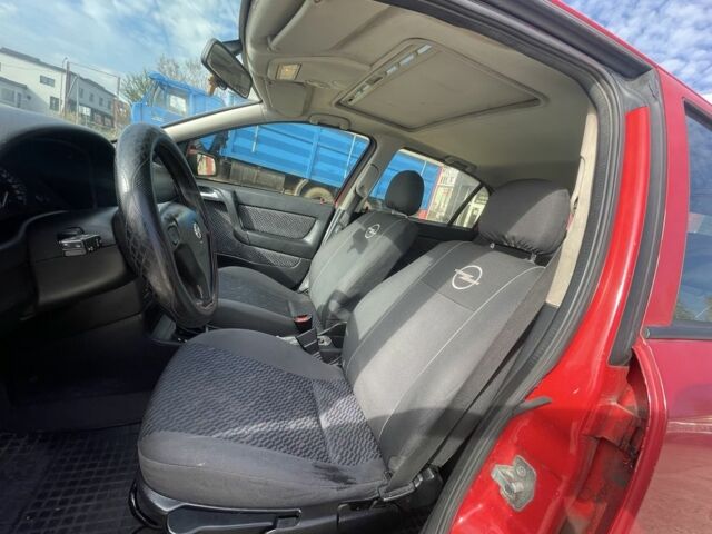 Красный Опель Астра, объемом двигателя 1.8 л и пробегом 300 тыс. км за 2200 $, фото 13 на Automoto.ua