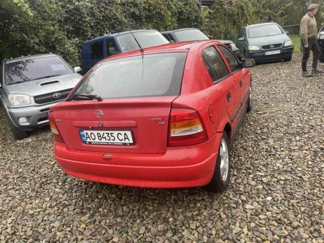 Красный Опель Астра, объемом двигателя 1.8 л и пробегом 300 тыс. км за 2200 $, фото 4 на Automoto.ua