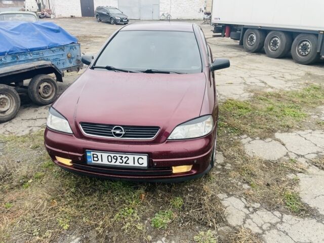 Красный Опель Астра, объемом двигателя 1.6 л и пробегом 270 тыс. км за 4000 $, фото 4 на Automoto.ua