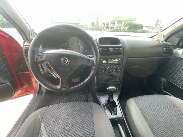 Красный Опель Астра, объемом двигателя 1.8 л и пробегом 300 тыс. км за 2200 $, фото 15 на Automoto.ua