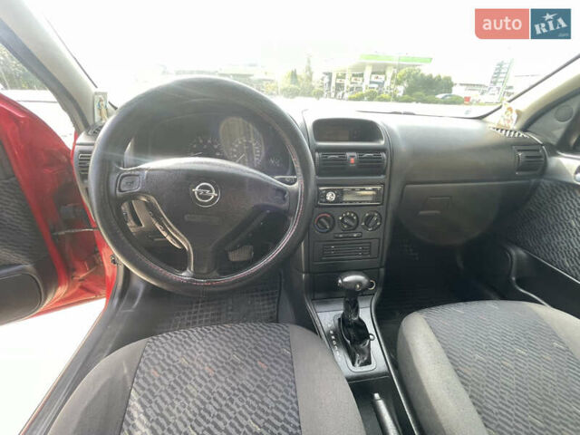 Червоний Опель Астра, об'ємом двигуна 1.8 л та пробігом 300 тис. км за 2200 $, фото 14 на Automoto.ua
