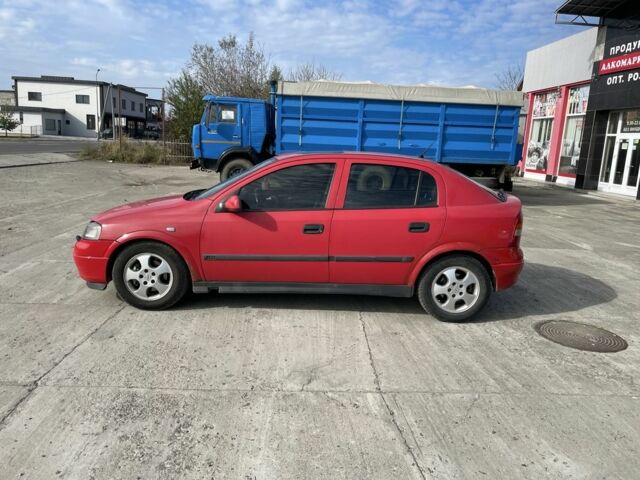 Красный Опель Астра, объемом двигателя 1.8 л и пробегом 300 тыс. км за 2200 $, фото 5 на Automoto.ua