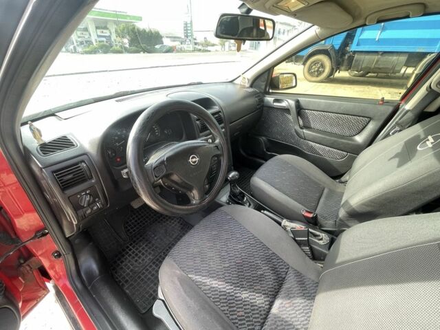 Красный Опель Астра, объемом двигателя 1.8 л и пробегом 300 тыс. км за 2200 $, фото 14 на Automoto.ua