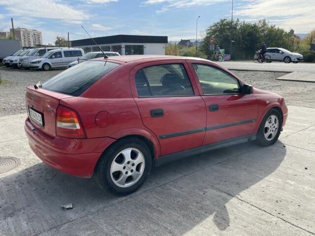 Красный Опель Астра, объемом двигателя 1.8 л и пробегом 300 тыс. км за 2200 $, фото 10 на Automoto.ua