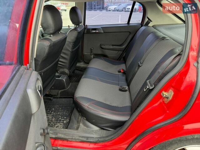 Красный Опель Астра, объемом двигателя 1.4 л и пробегом 247 тыс. км за 3200 $, фото 16 на Automoto.ua