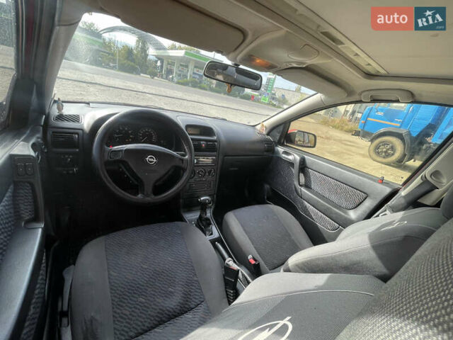 Червоний Опель Астра, об'ємом двигуна 1.8 л та пробігом 300 тис. км за 2200 $, фото 18 на Automoto.ua