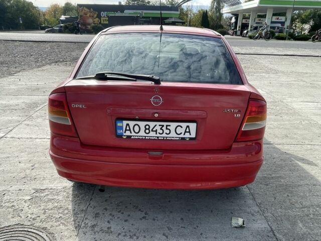 Красный Опель Астра, объемом двигателя 1.8 л и пробегом 300 тыс. км за 2200 $, фото 8 на Automoto.ua