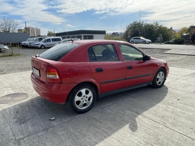 Красный Опель Астра, объемом двигателя 1.8 л и пробегом 300 тыс. км за 2200 $, фото 9 на Automoto.ua