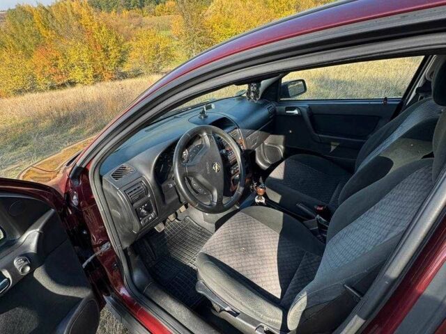 Красный Опель Астра, объемом двигателя 1.6 л и пробегом 149 тыс. км за 4045 $, фото 8 на Automoto.ua