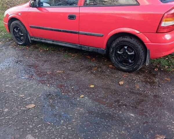 Красный Опель Астра, объемом двигателя 1.4 л и пробегом 264 тыс. км за 2700 $, фото 2 на Automoto.ua