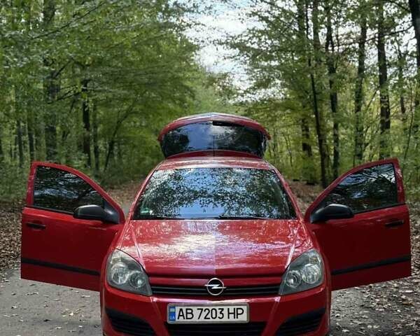 Красный Опель Астра, объемом двигателя 1.42 л и пробегом 153 тыс. км за 4700 $, фото 7 на Automoto.ua