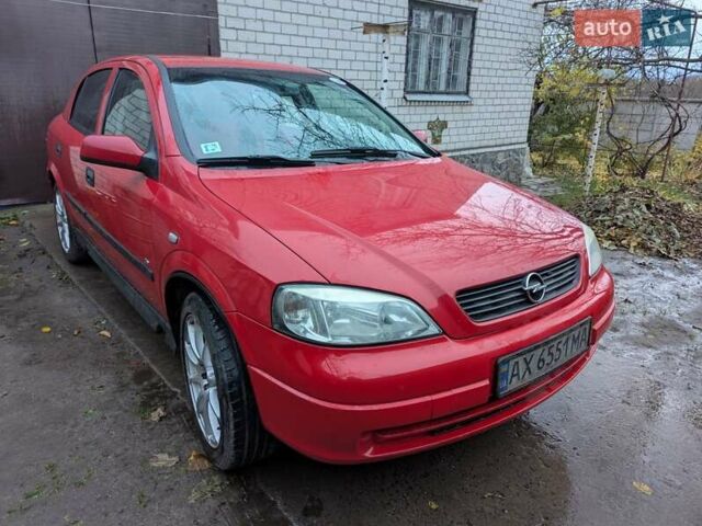 Красный Опель Астра, объемом двигателя 1.36 л и пробегом 207 тыс. км за 3650 $, фото 1 на Automoto.ua