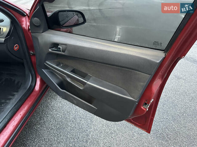 Червоний Опель Астра, об'ємом двигуна 1.36 л та пробігом 267 тис. км за 4000 $, фото 12 на Automoto.ua