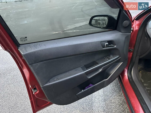 Червоний Опель Астра, об'ємом двигуна 1.36 л та пробігом 267 тис. км за 4000 $, фото 8 на Automoto.ua