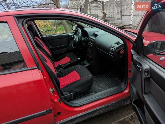 Красный Опель Астра, объемом двигателя 1.36 л и пробегом 207 тыс. км за 3650 $, фото 11 на Automoto.ua
