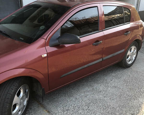 Красный Опель Астра, объемом двигателя 1.4 л и пробегом 197 тыс. км за 4500 $, фото 1 на Automoto.ua