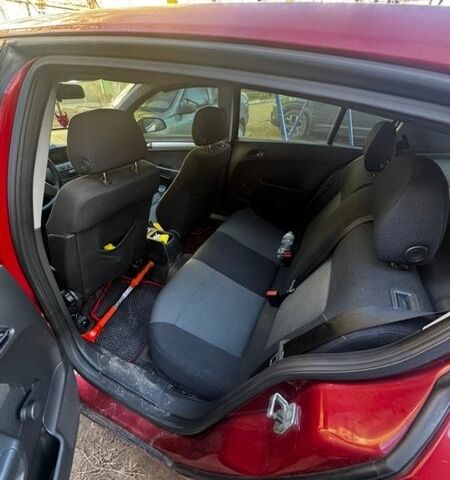 Красный Опель Астра, объемом двигателя 1.6 л и пробегом 156 тыс. км за 4500 $, фото 3 на Automoto.ua