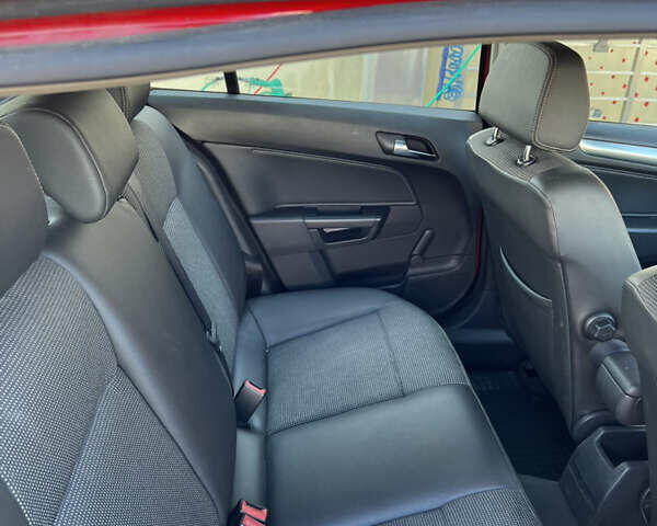 Красный Опель Астра, объемом двигателя 1.69 л и пробегом 300 тыс. км за 4199 $, фото 14 на Automoto.ua