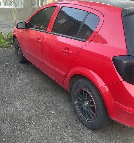 Красный Опель Астра, объемом двигателя 1.4 л и пробегом 200 тыс. км за 4000 $, фото 1 на Automoto.ua