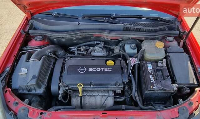 Красный Опель Астра, объемом двигателя 1.8 л и пробегом 262 тыс. км за 3400 $, фото 8 на Automoto.ua
