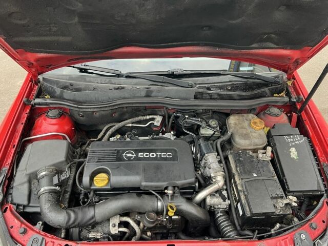 Красный Опель Астра, объемом двигателя 1.7 л и пробегом 220 тыс. км за 2450 $, фото 11 на Automoto.ua