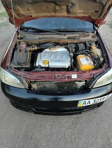 Красный Опель Астра, объемом двигателя 1.8 л и пробегом 150 тыс. км за 1201 $, фото 5 на Automoto.ua