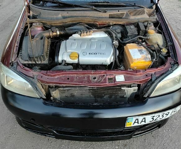 Красный Опель Астра, объемом двигателя 1.8 л и пробегом 150 тыс. км за 1201 $, фото 6 на Automoto.ua