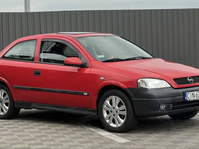 Красный Опель Астра, объемом двигателя 1.6 л и пробегом 324 тыс. км за 1500 $, фото 1 на Automoto.ua