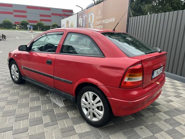 Красный Опель Астра, объемом двигателя 1.6 л и пробегом 324 тыс. км за 1500 $, фото 3 на Automoto.ua