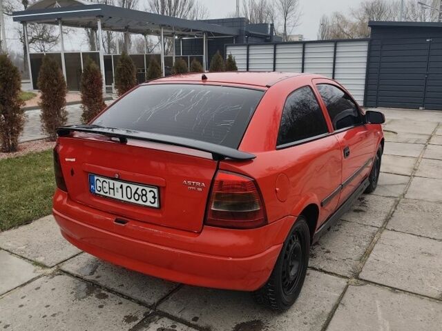Червоний Опель Астра, об'ємом двигуна 2 л та пробігом 300 тис. км за 1450 $, фото 4 на Automoto.ua