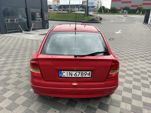 Красный Опель Астра, объемом двигателя 1.6 л и пробегом 324 тыс. км за 1500 $, фото 5 на Automoto.ua