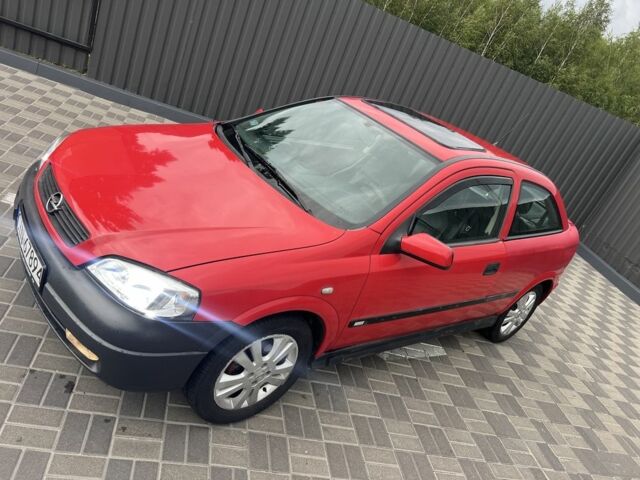 Красный Опель Астра, объемом двигателя 1.6 л и пробегом 324 тыс. км за 1500 $, фото 9 на Automoto.ua