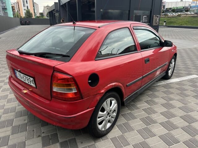 Красный Опель Астра, объемом двигателя 1.6 л и пробегом 324 тыс. км за 1500 $, фото 4 на Automoto.ua