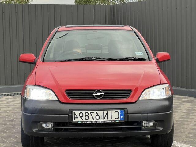 Красный Опель Астра, объемом двигателя 1.6 л и пробегом 324 тыс. км за 1500 $, фото 2 на Automoto.ua