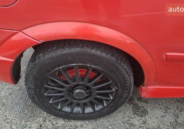 Красный Опель Астра, объемом двигателя 1.6 л и пробегом 220 тыс. км за 3300 $, фото 19 на Automoto.ua