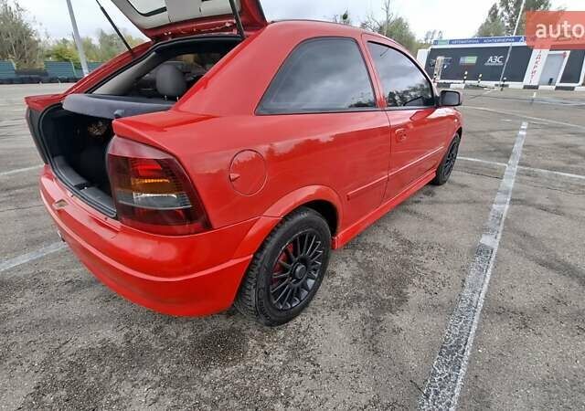 Красный Опель Астра, объемом двигателя 1.6 л и пробегом 220 тыс. км за 3300 $, фото 9 на Automoto.ua