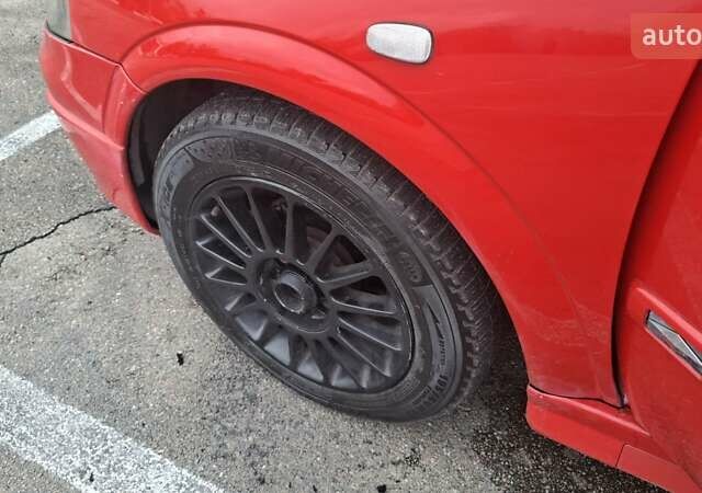 Красный Опель Астра, объемом двигателя 1.6 л и пробегом 220 тыс. км за 3300 $, фото 10 на Automoto.ua